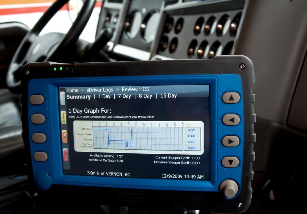 Blue Device Displays Driving Data In A Vehicle's Dashboard — MC Automotive Service & Repairs in Maitland, NSW