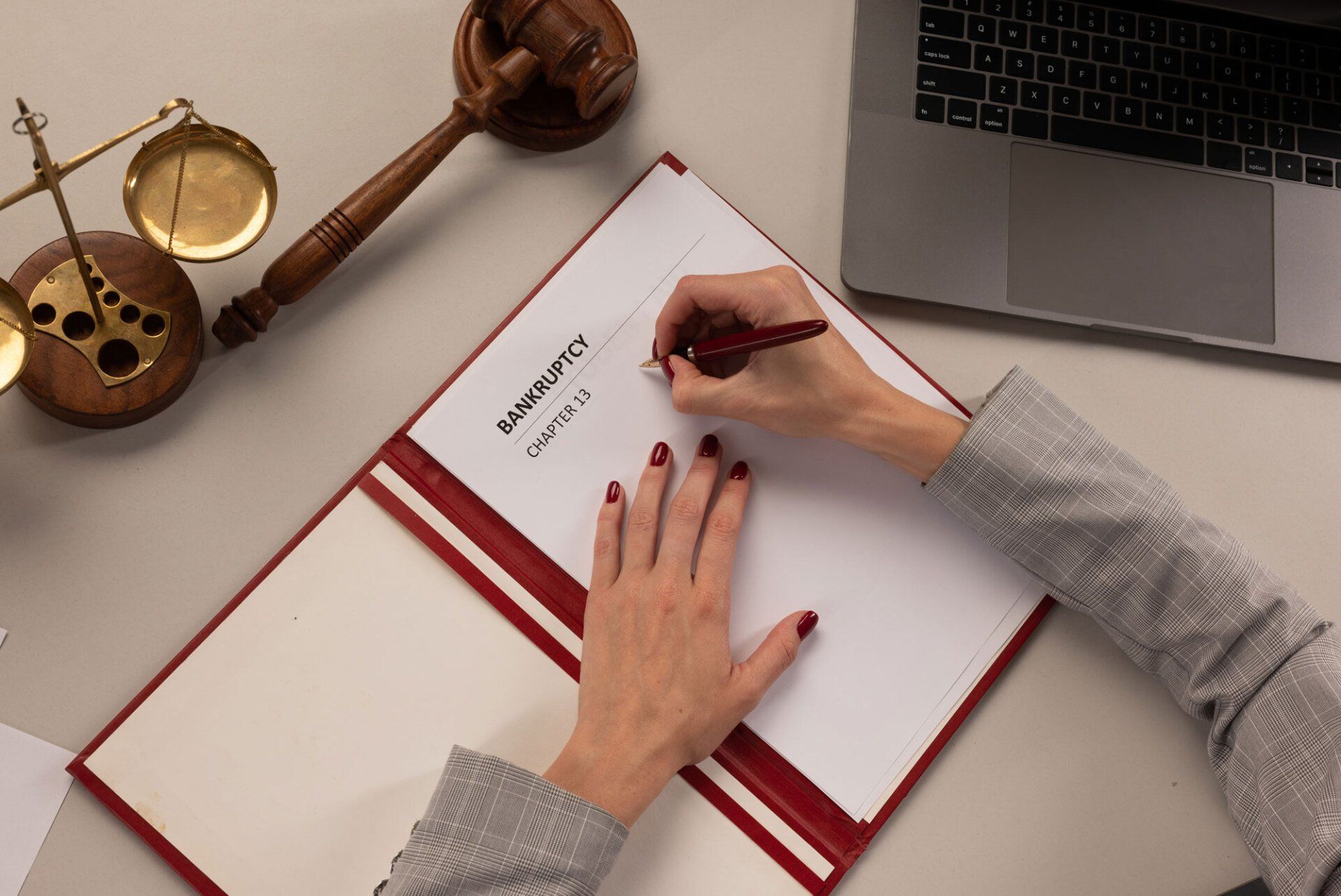 Female lawyer writing about Bankruptcy Chapter 13