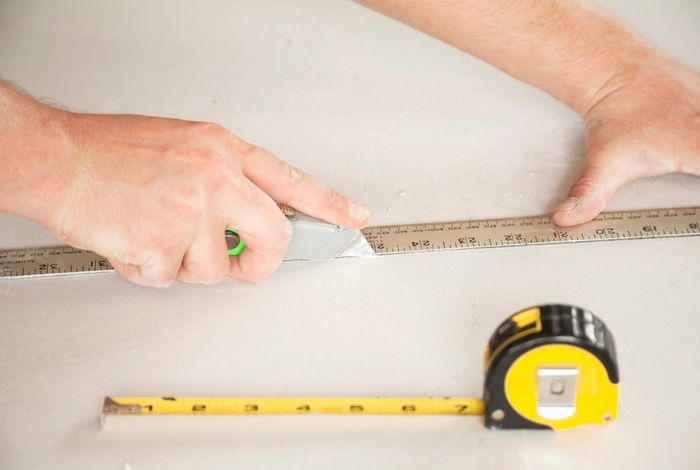 cutting drywall sheet