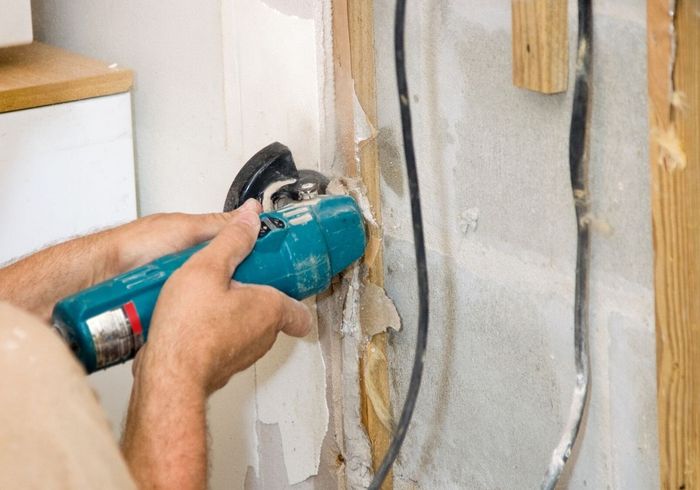 cutting into wall with handheld saw