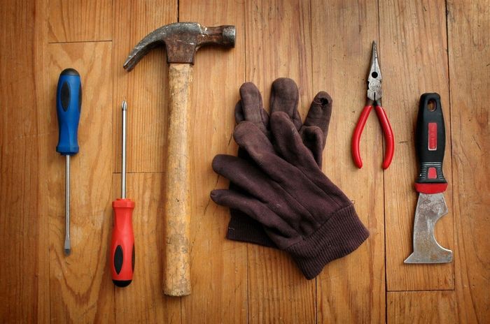 tools on wood floor used by Kent Handyman