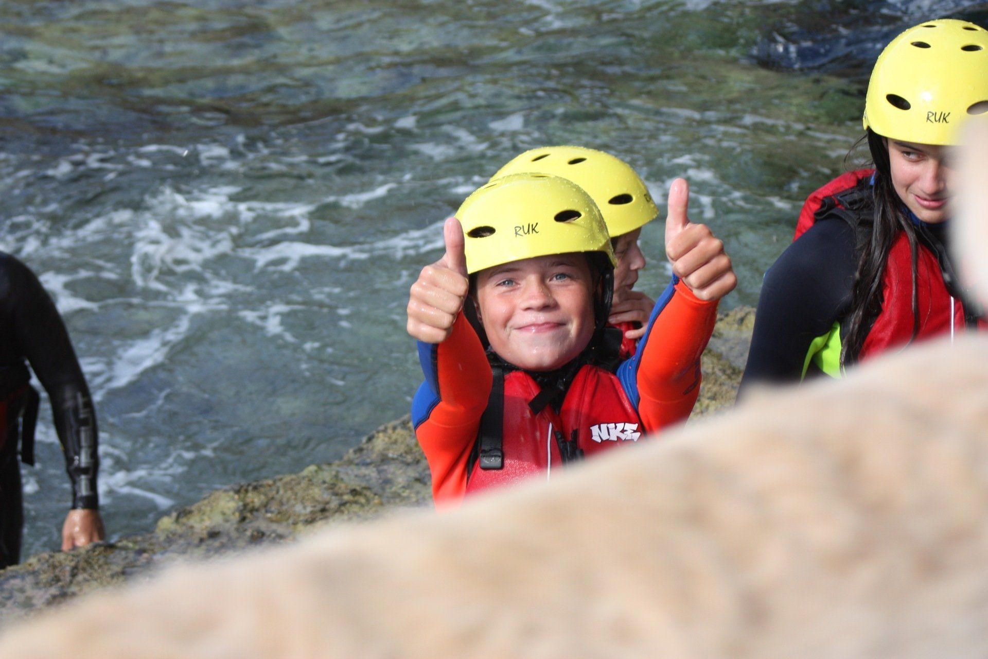 Happy child Coasteering with Portland Outdoor Centre