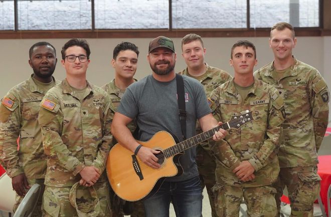 Jimmy Charles with Active Duty Service Members