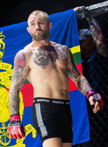 a man wearing a white shirt that says oktagon mma