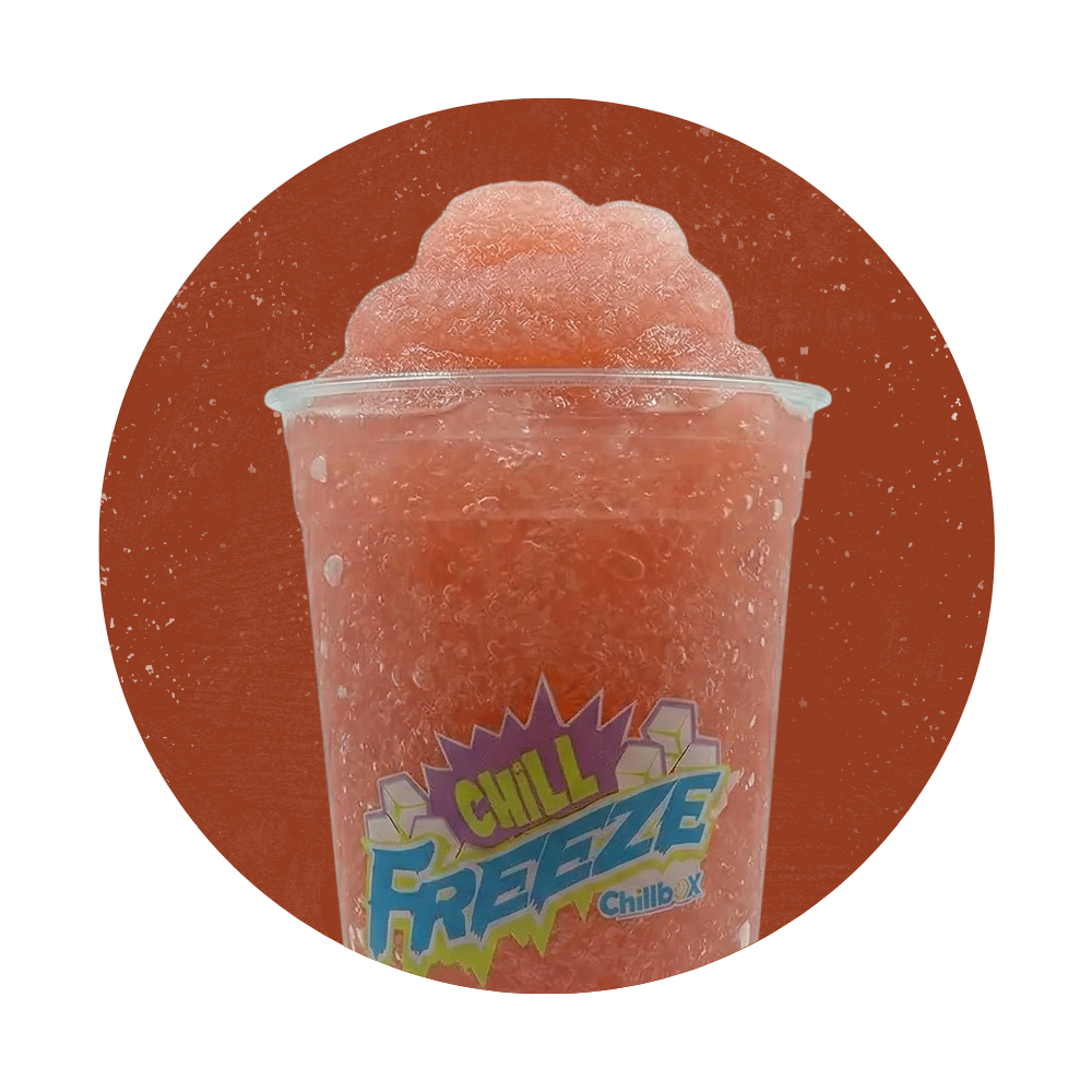 Pink frozen drink in a clear cup with a colorful “Chill Freeze” label on a red background
