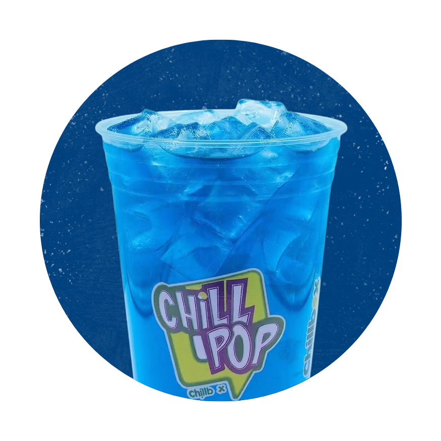 Blue Chill Pop drink in a clear cup with ice, set against a starry dark blue background