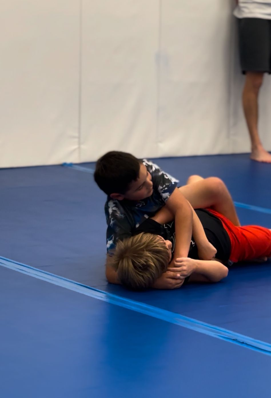 Kids practicing grappling drills at Vacaville Grappling Academy in Vacaville, CA, building discipline and leadership.
