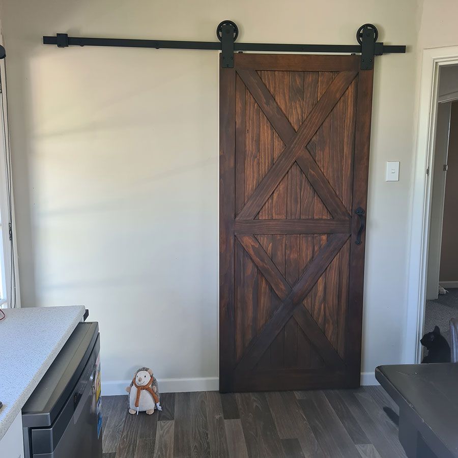 stained pine double x barn door