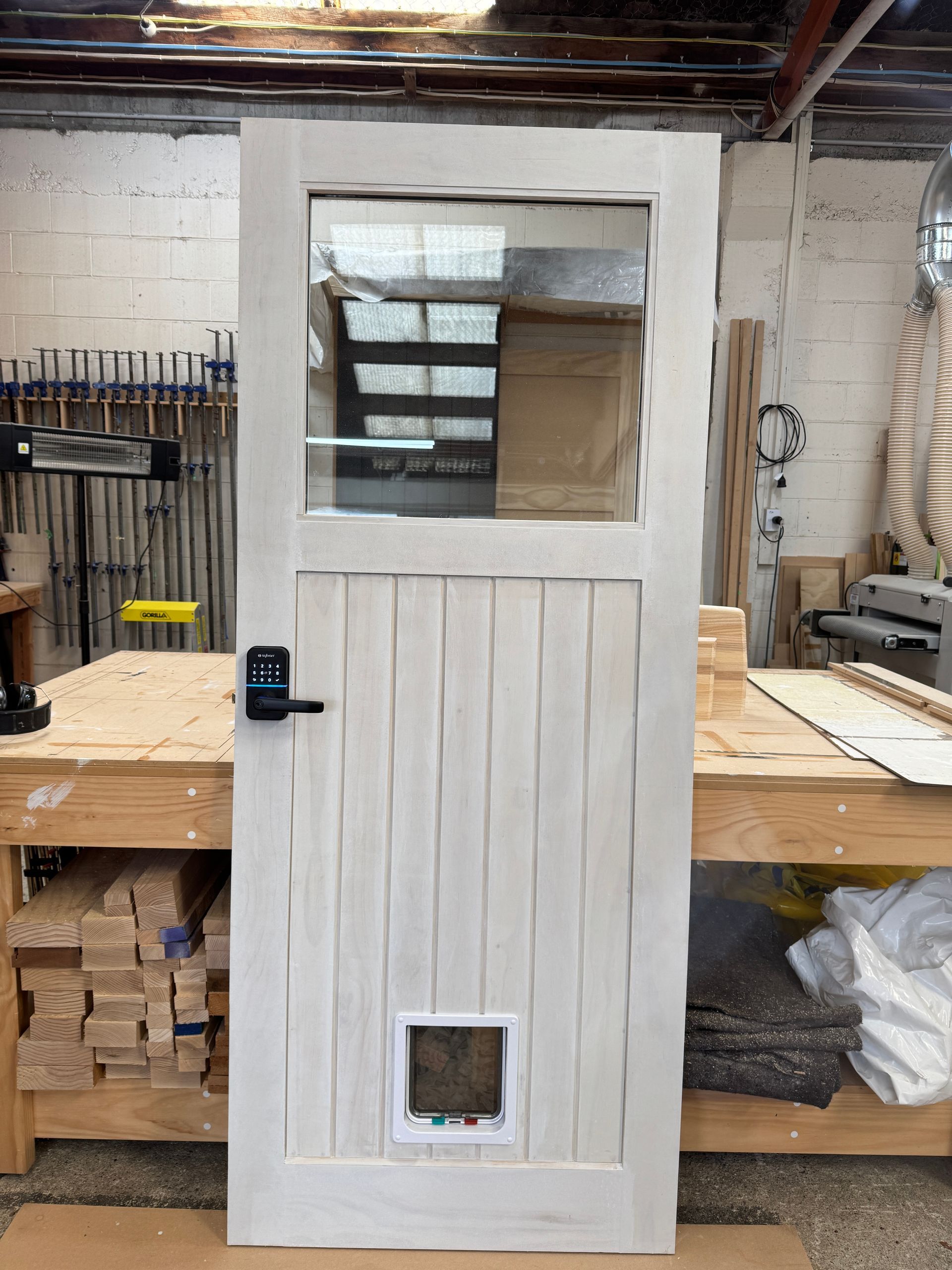 Front door with double glazing, cat door and smart lock