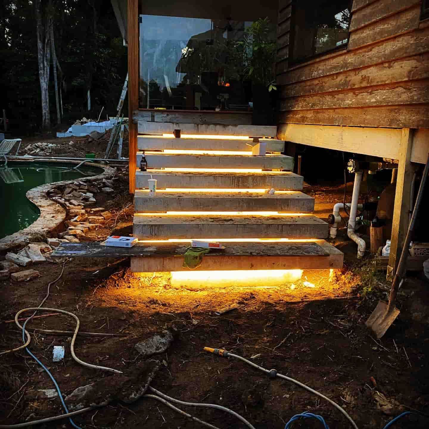 A Set of Stairs that Are Lit up In Front of A House — Higgins Electrical in Beerwah, QLD