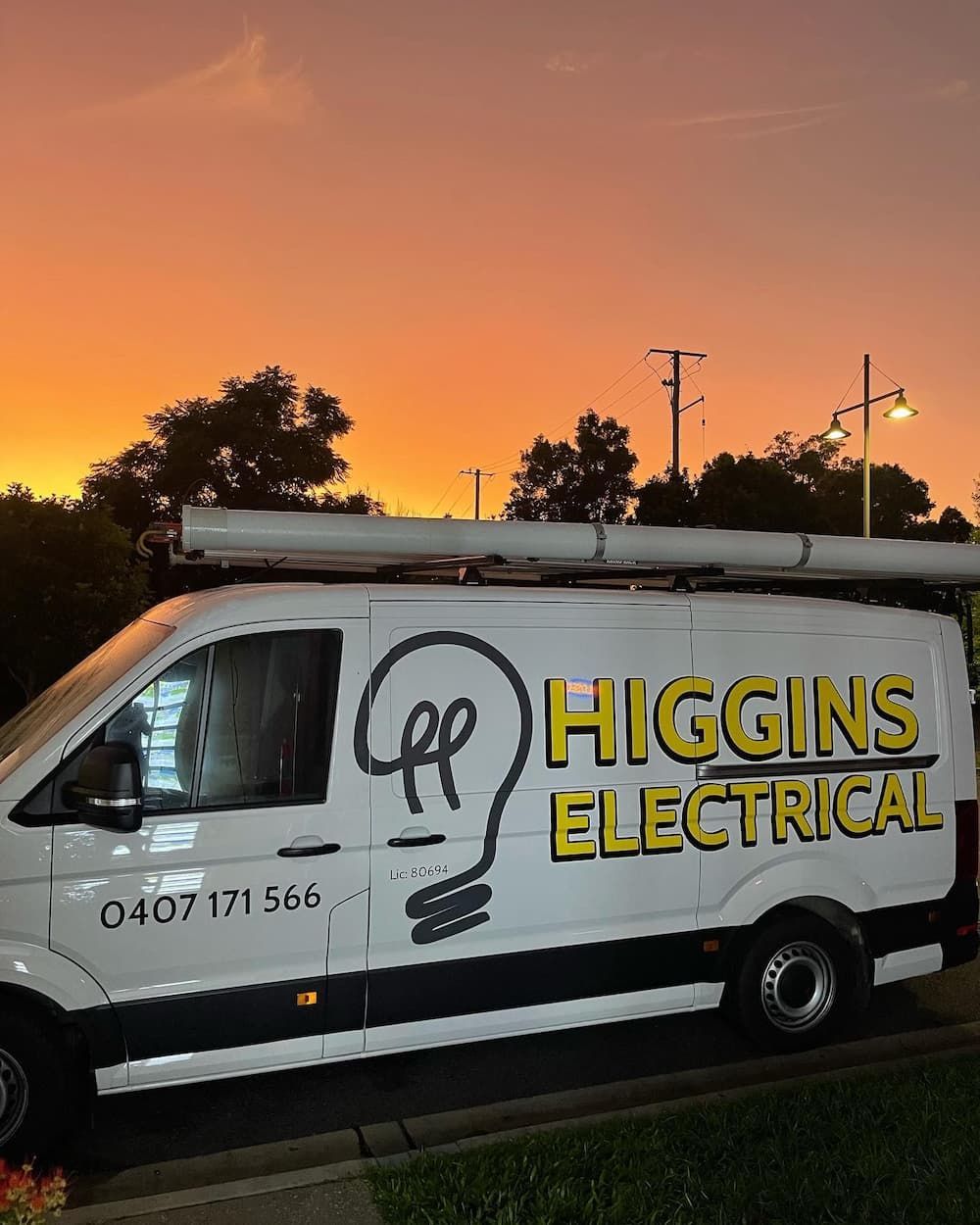 White Higgins Electrical Van With Logo Parked — Higgins Electrical in Nambour, QLD