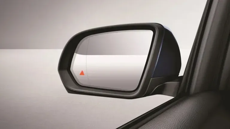 A close up of a side view mirror on a car | Quantum Calibrations