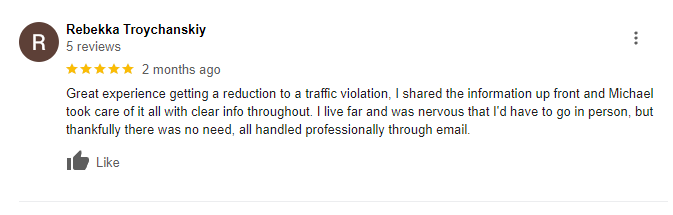 A blurred image of a person 's facebook review.