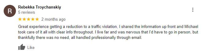 A blurred image of a review on a facebook page.