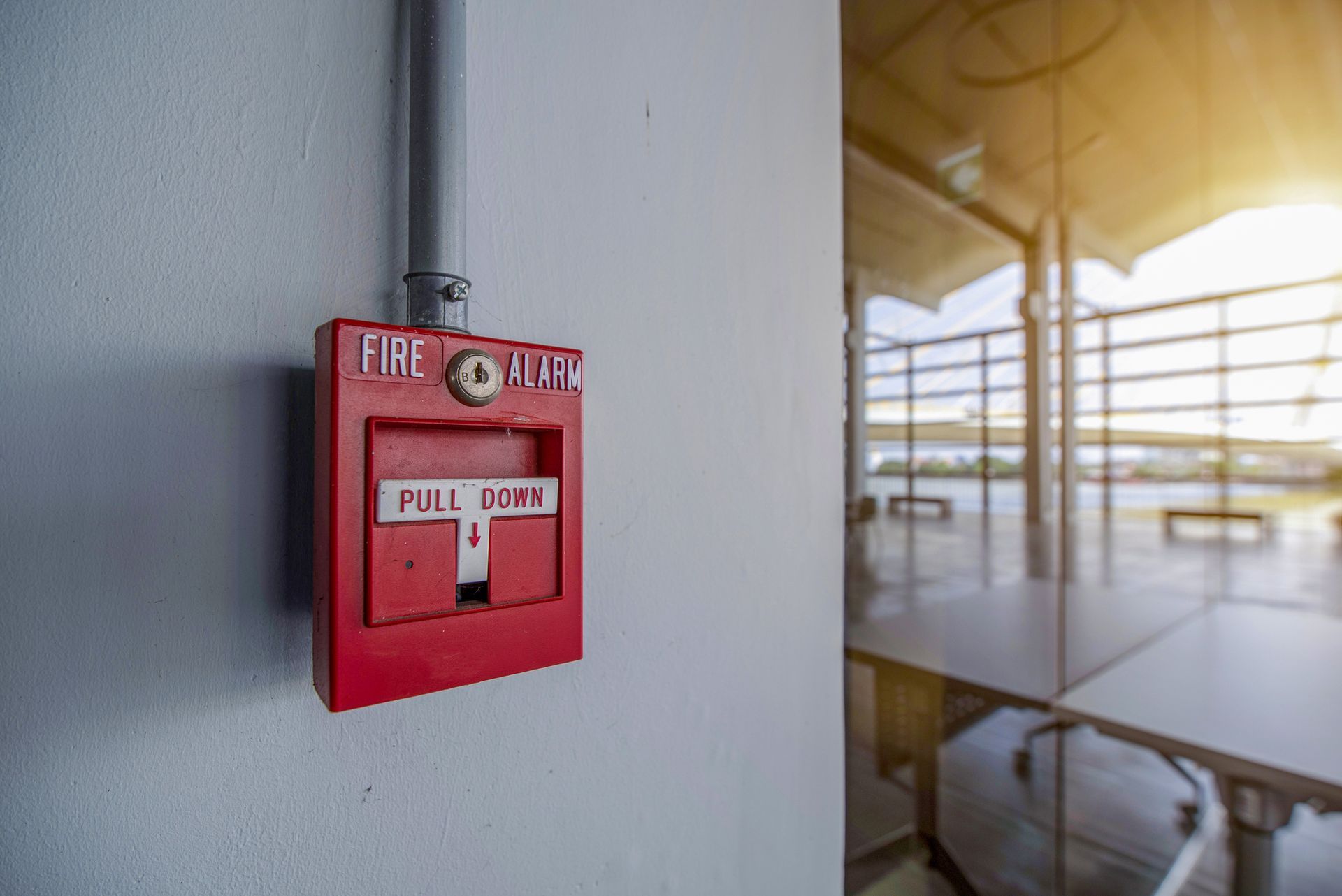 A fire alarm on the wall.