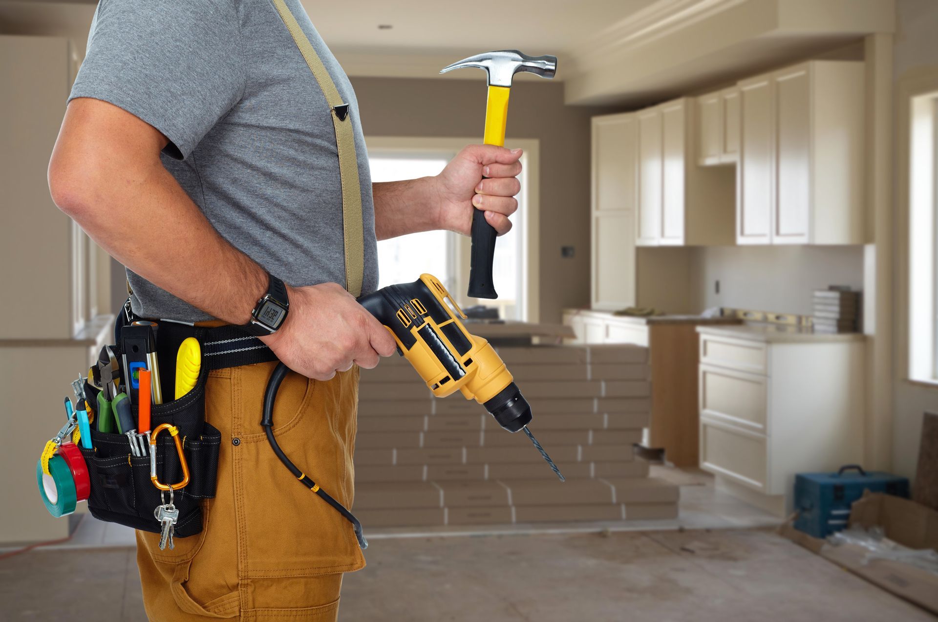 Construction Worker With Hammer and Drill