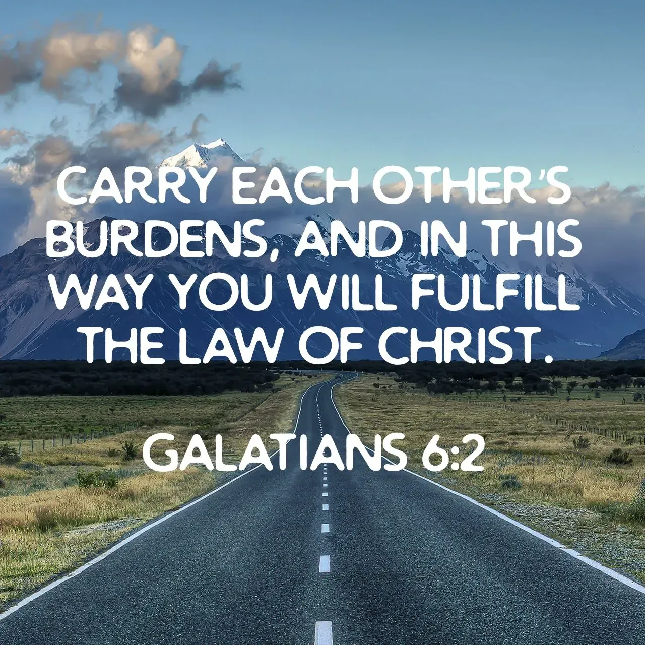 A picture of a road with a quote from the bible