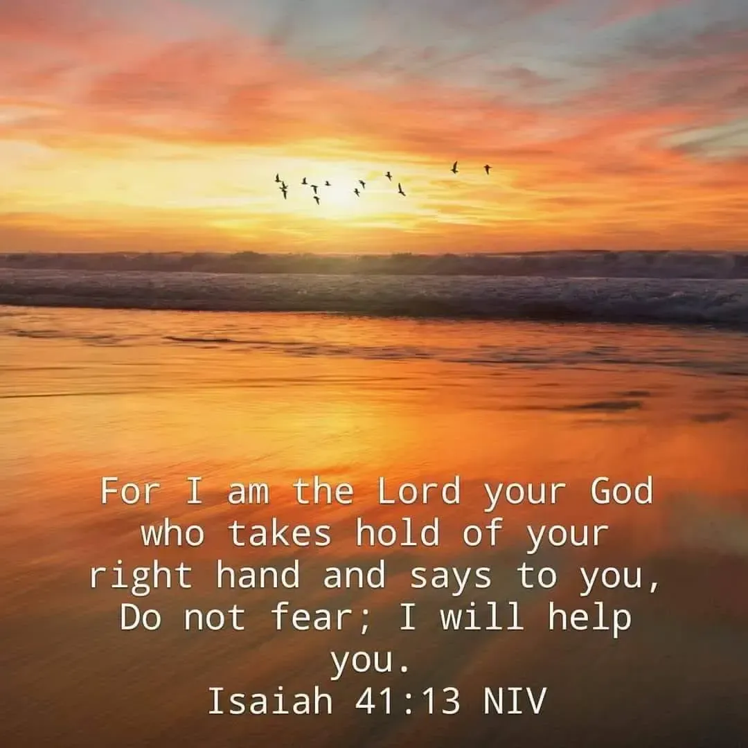A picture of a sunset with a bible verse from isaiah 41:13 niv
