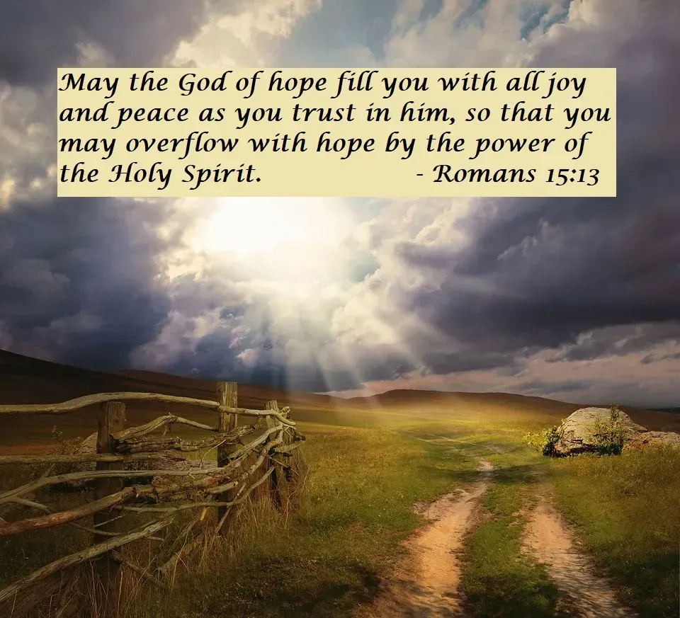 A picture of a field with a quote from romans 15:13