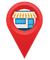 Red map pin with a storefront icon in blue and yellow inside