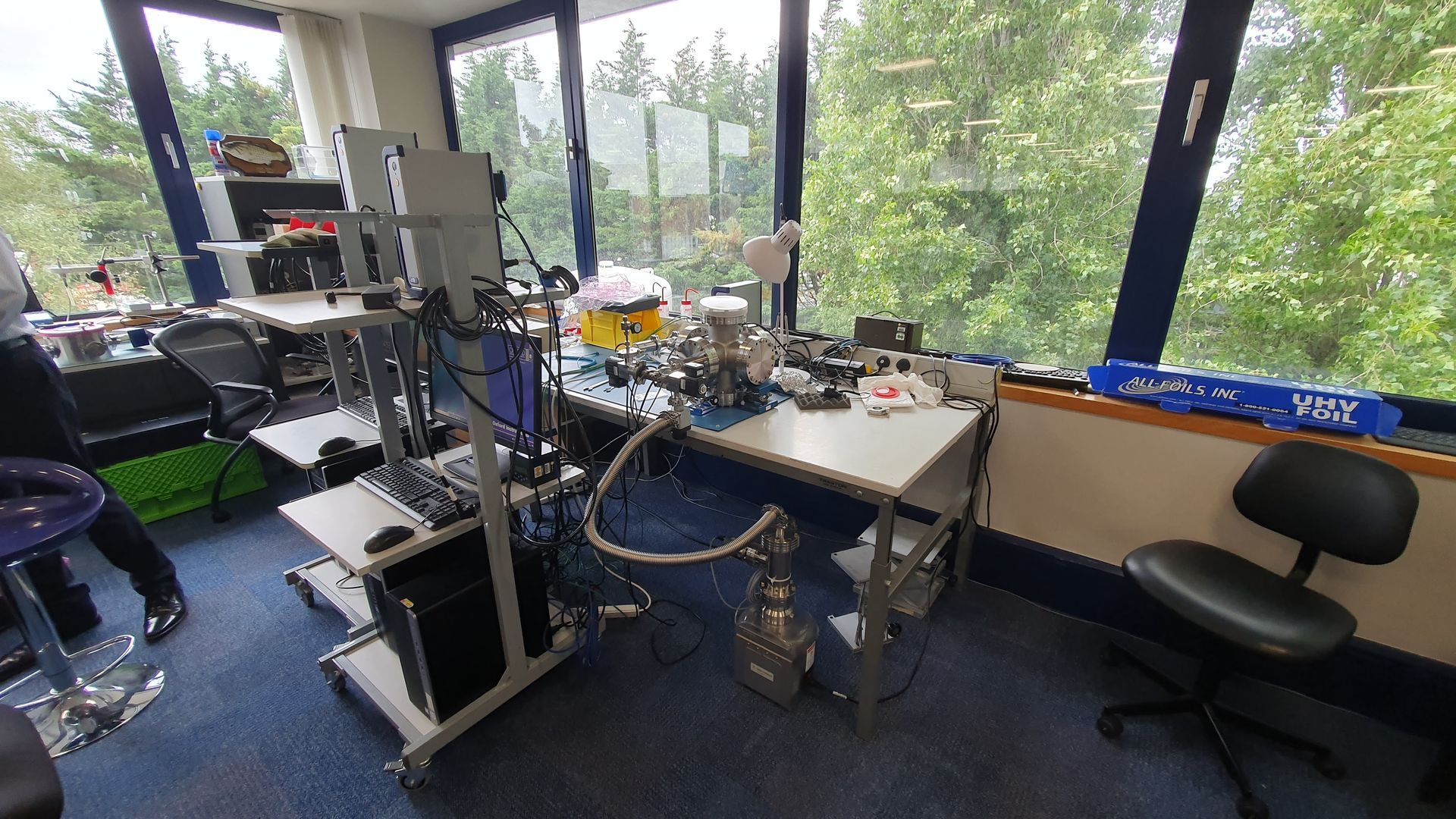 A cluttered room filled with lots of electronics and tools.