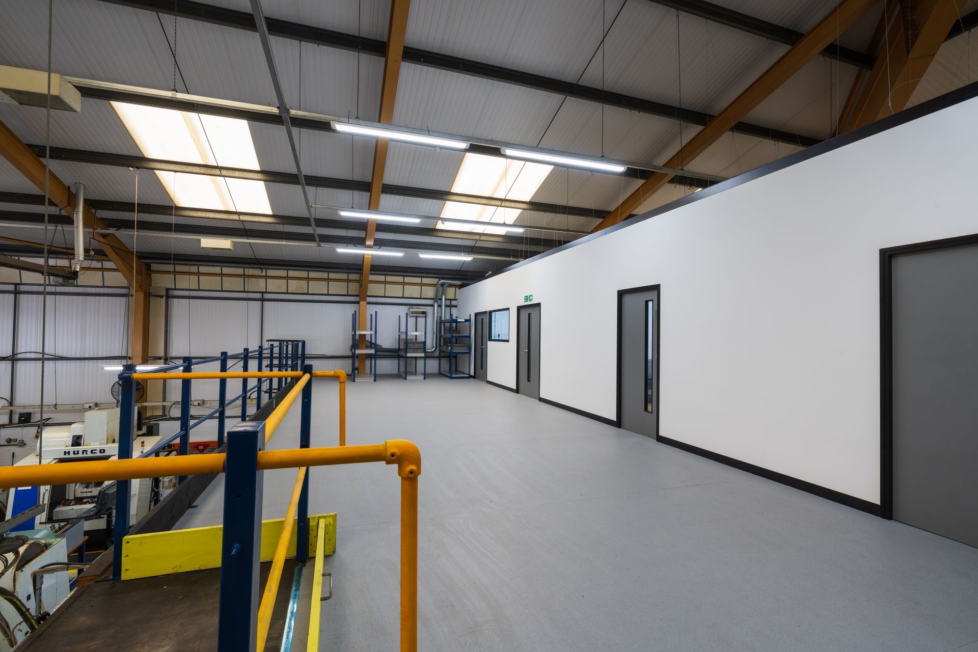 A room with a bed, chairs, lamps and a wall that says `` experience weightlessness ''. Specialist nursing care beds