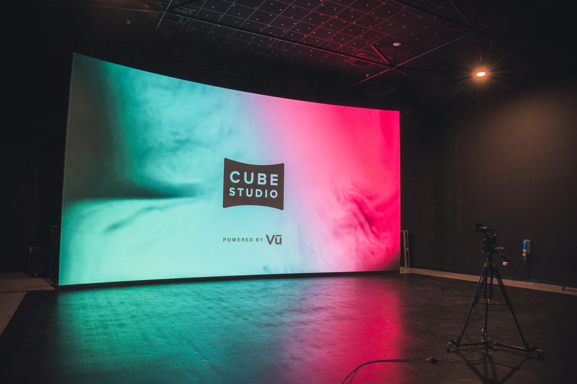 There is a large screen in the middle of the room.
