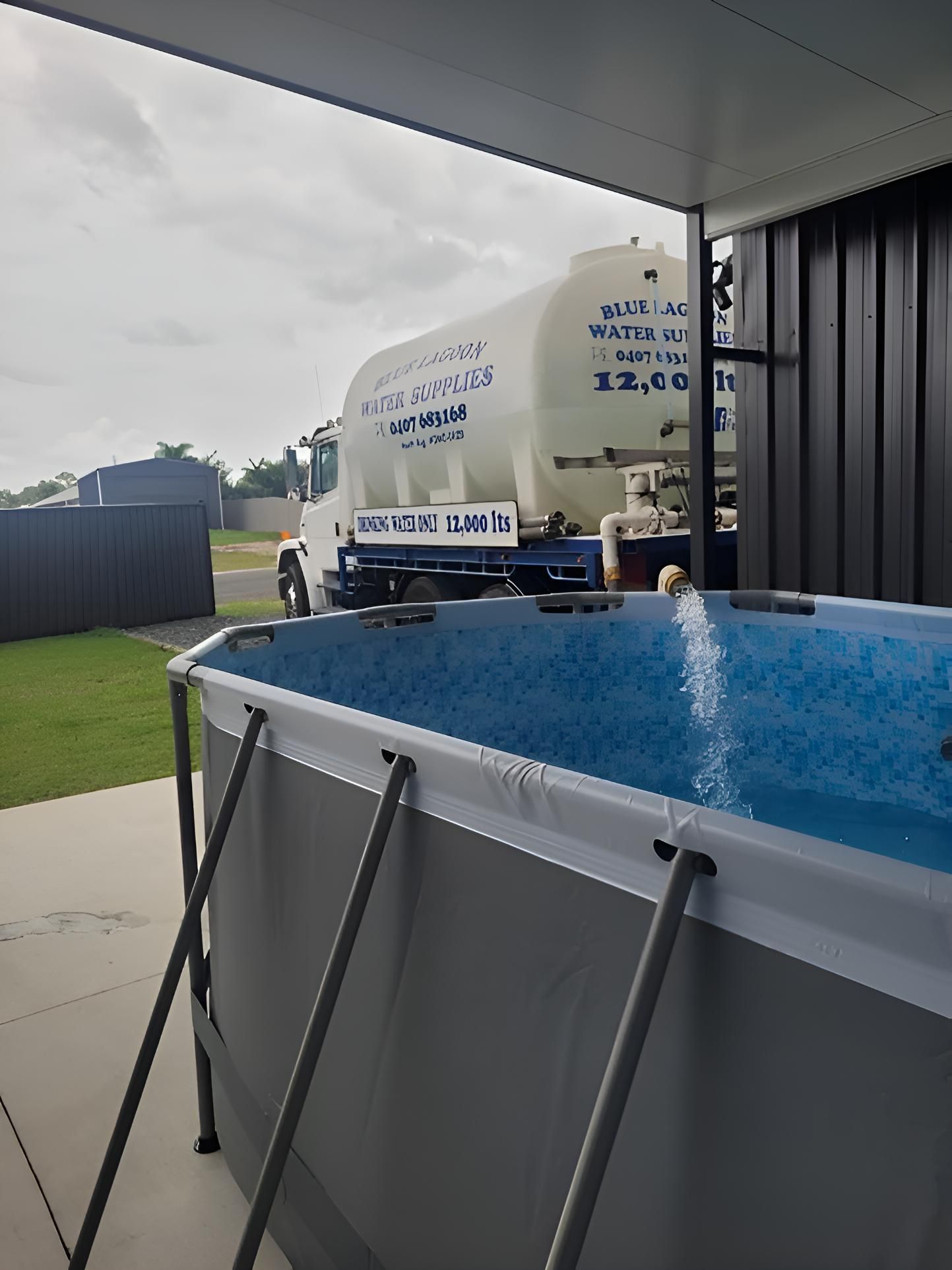 A Large Swimming Pool With A Truck In The Background — Blue Lagoon Water Supplies In Urangan, QLD