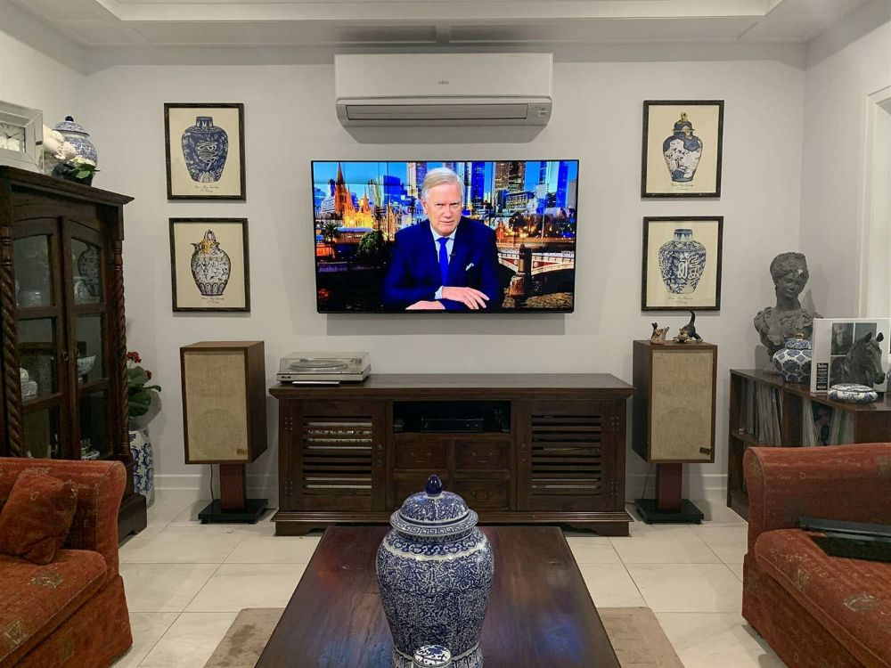 A Living Room with A Flat Screen Tv on The Wall — T.N. Locke Communications In Kirwan, QLD