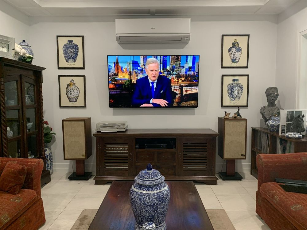 A Living Room with A Flat Screen Tv on The Wall — T.N. Locke Communications In Kirwan, QLD