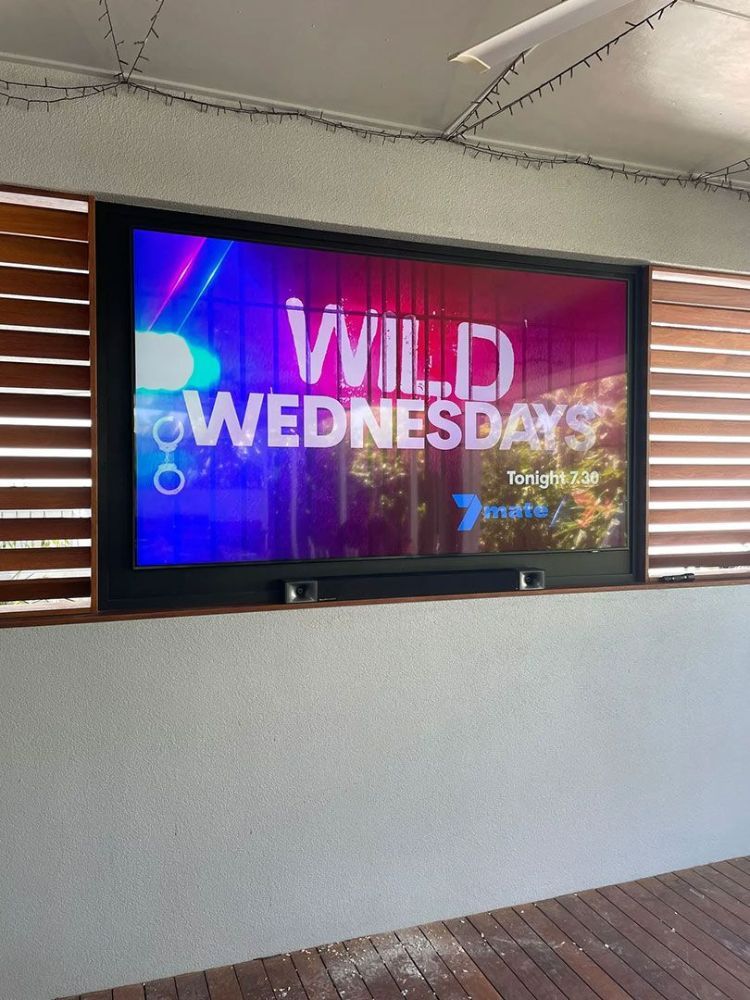 A Large Flat Screen Tv with The Words Wild Wednesday on It — T.N. Locke Communications In Kirwan, QLD