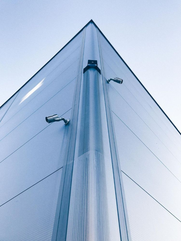 Looking up At the Corner of A Building — T.N. Locke Communications In Kirwan, QLD