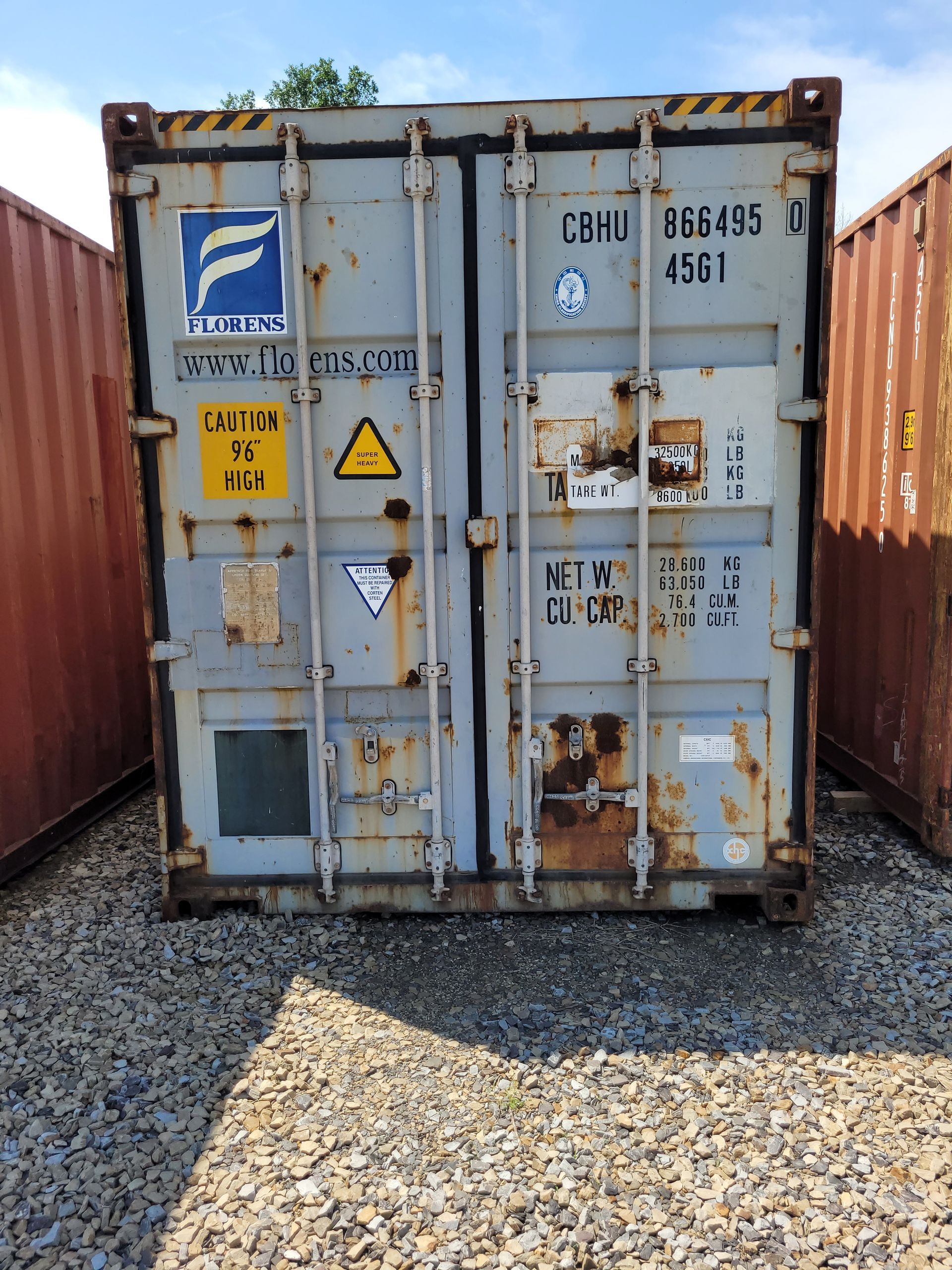 A rusty shipping container with the number 4580 on it