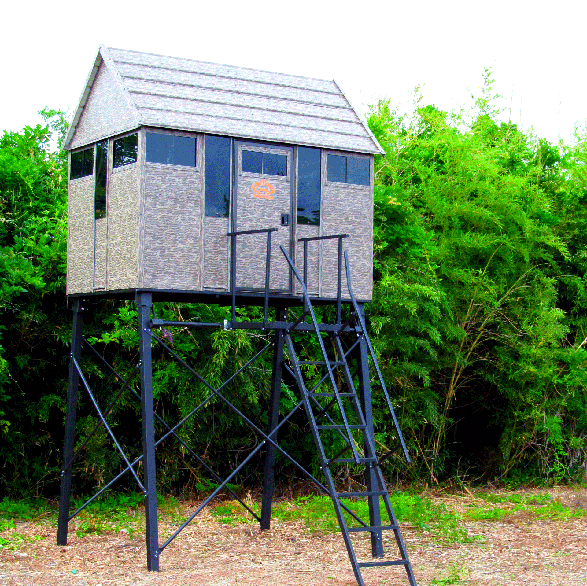 A small shed with stairs leading up to it