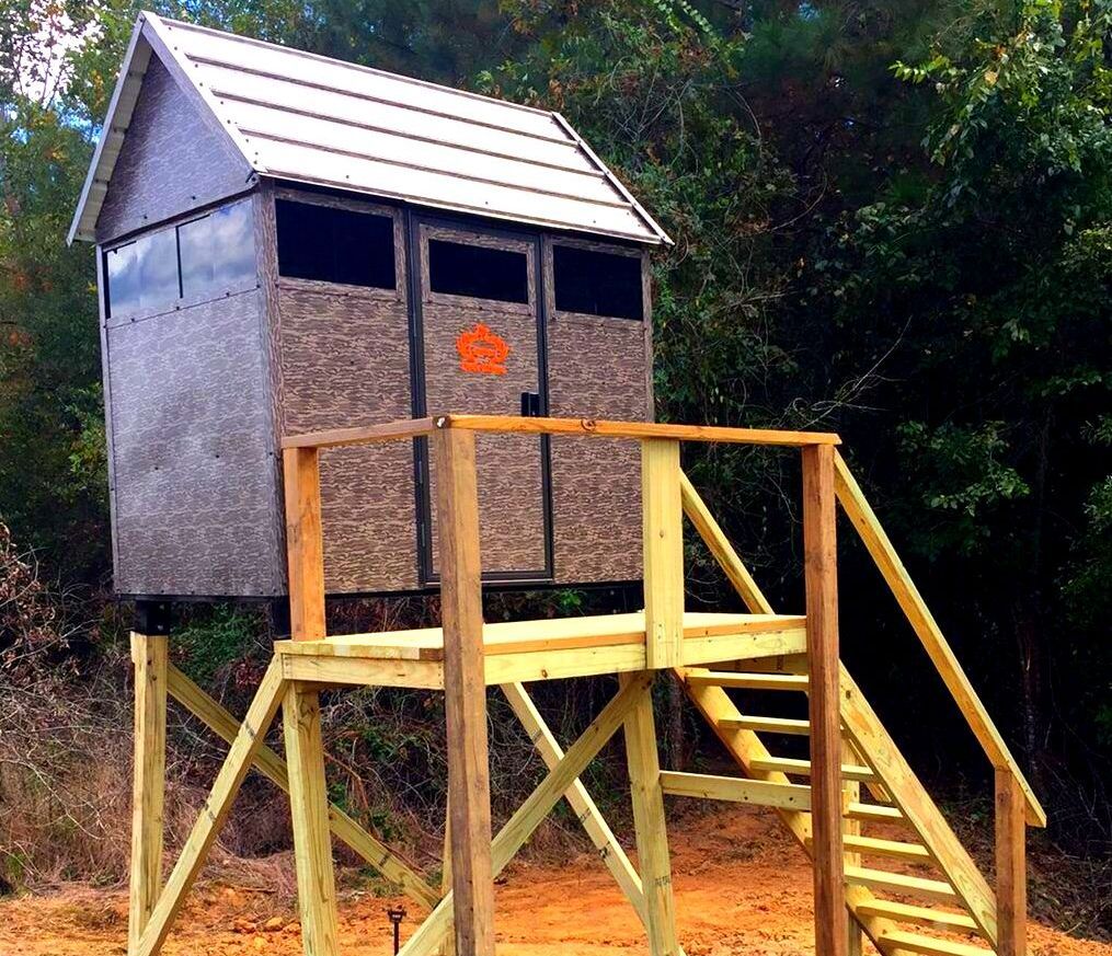 Superior Outdoor Centers deer blinds
A small wooden shed with stairs leading up to it