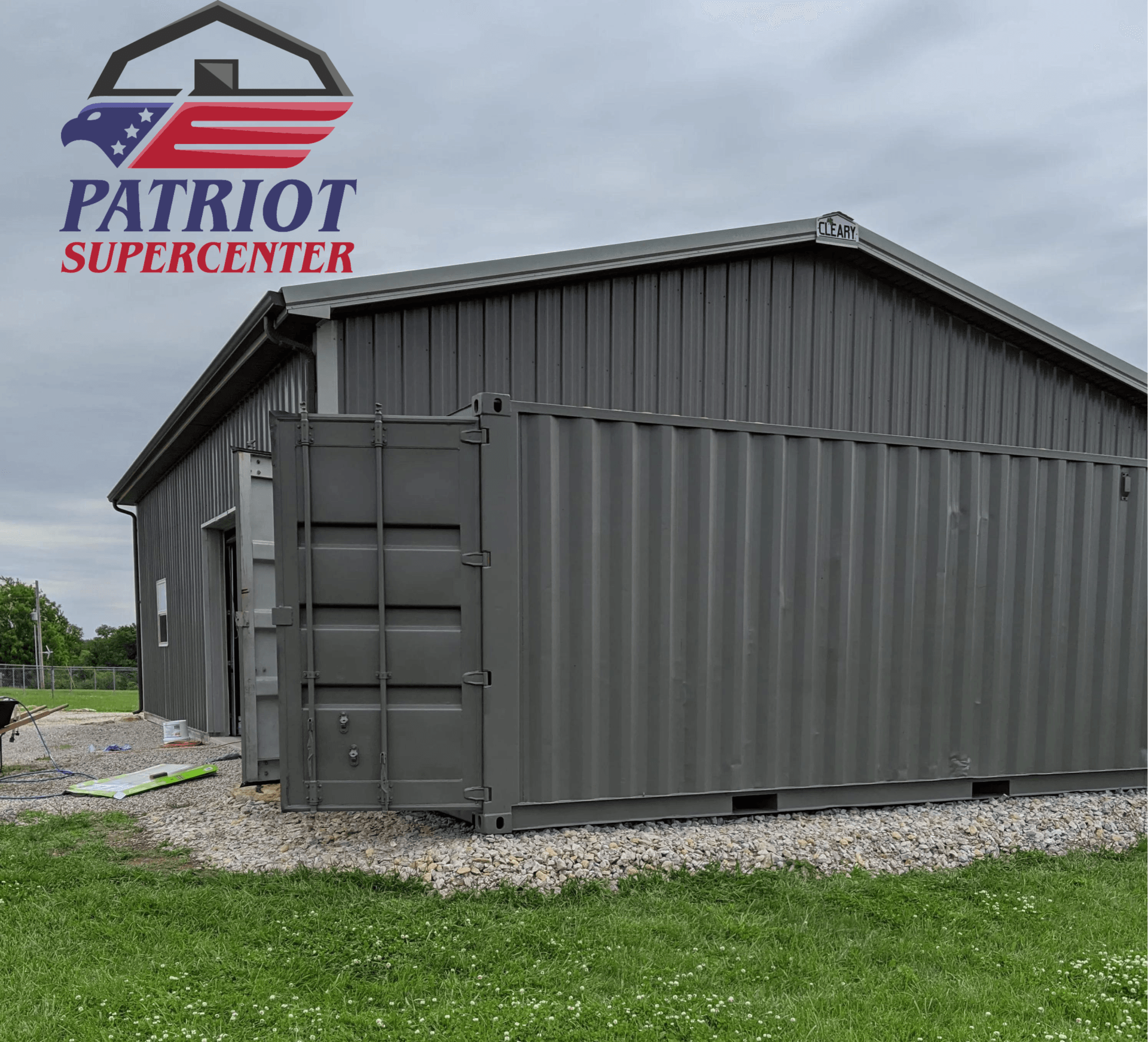 A patriot supercenter logo is on the side of a building