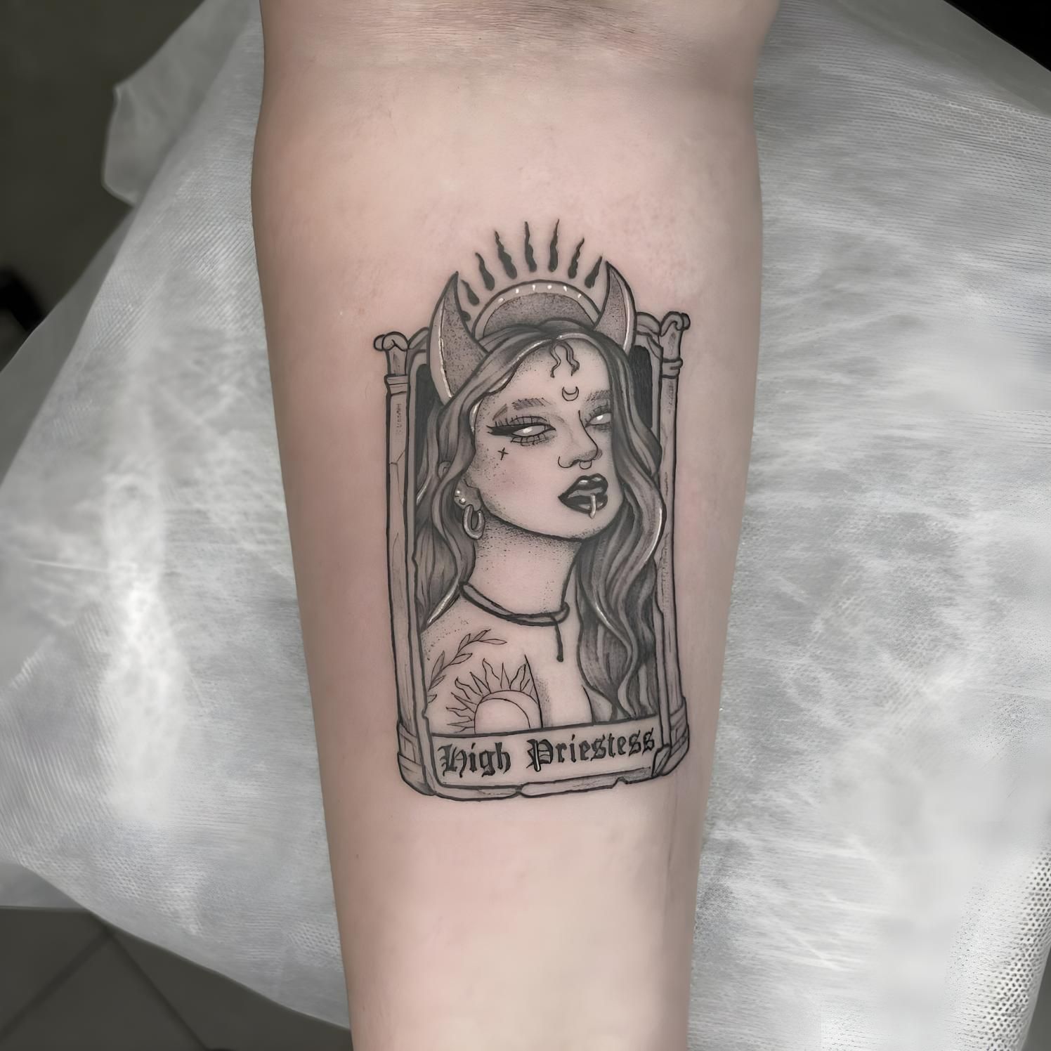 Tattoo Of A Woman With Horns And A Sun Halo, Labeled — Tattoo Inc Studio In Broadbeach, QLD