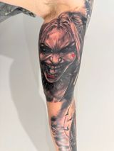 Close-up of a Forearm Tattoo Showing a Menacing Red-haired Monster — Tattoo Inc Studio In Broadbeach, QLD