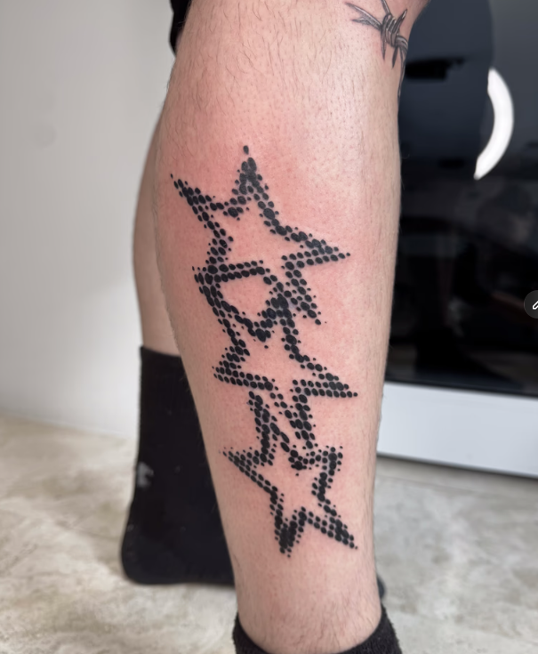 Black Star Tattoo on a Calf — Tattoo Inc Studio In Broadbeach, QLD