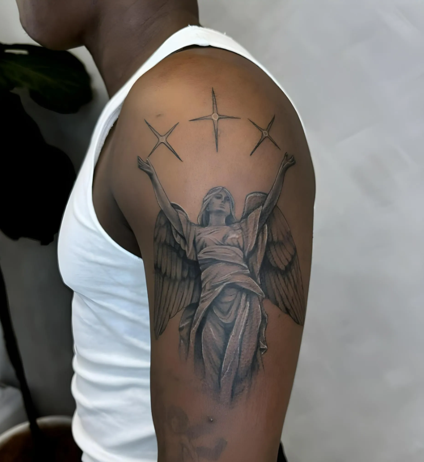Tattoo of an Angel Blowing a Horn on a Person's Chest— Tattoo Inc Studio In Broadbeach, QLD