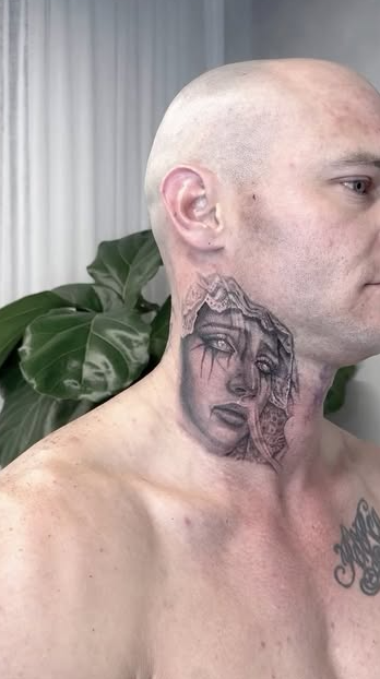 Bald Shirtless Man in Profile, Showing a Face Tattoo on His Neck — Tattoo Inc Studio In Broadbeach, QLD