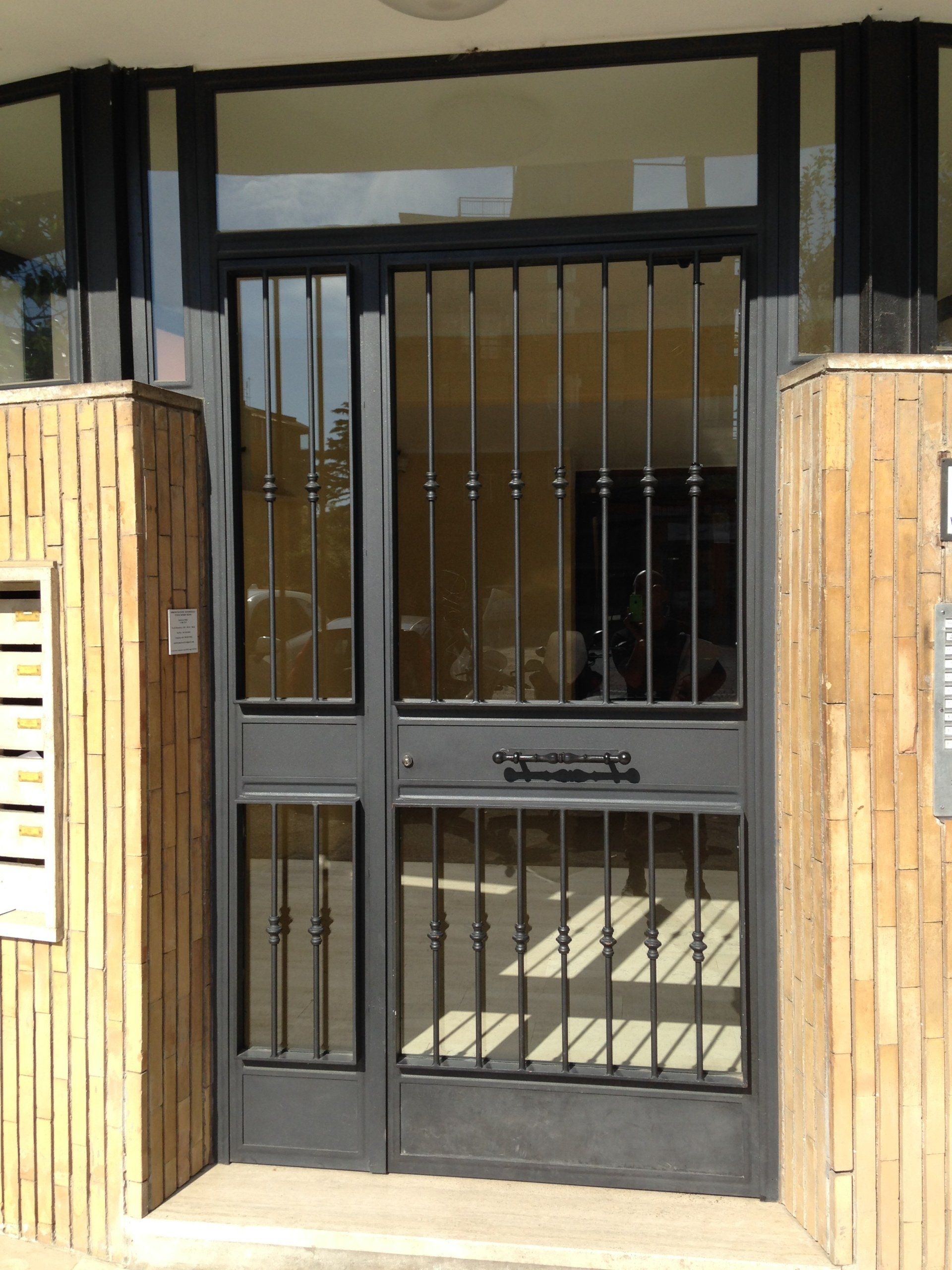 Porte d'ingresso con cancellata Comerci Serramenti Roma