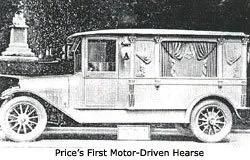 Vintage black-and-white photo of Price’s first motor-driven hearse, side view with curtains and large spoked wheels