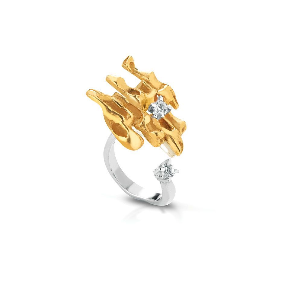 Anello in argento, bronzo e topazi bianchi