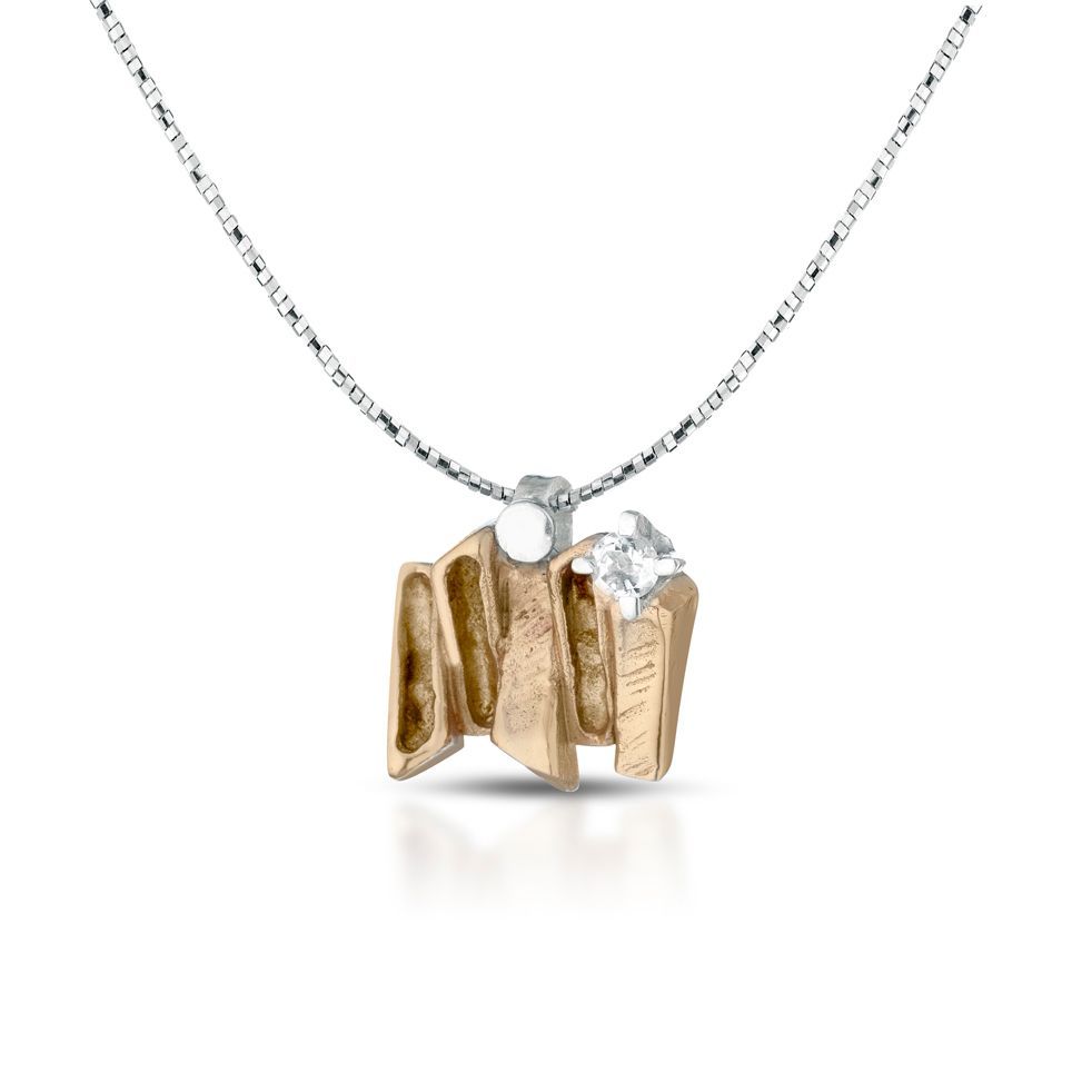 Pendente in bronzo, argento e topazio bianco