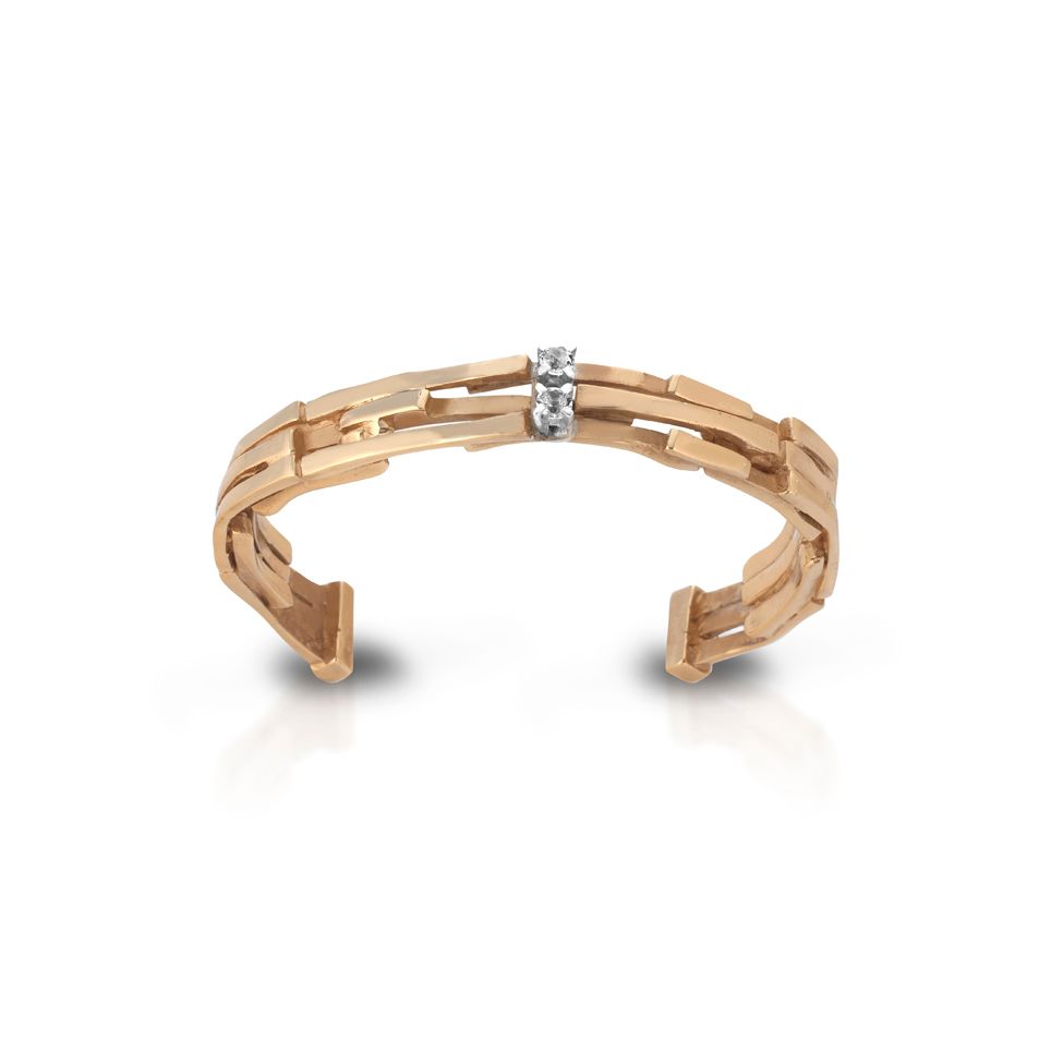 Bronze, silver, and white topaz bracelet