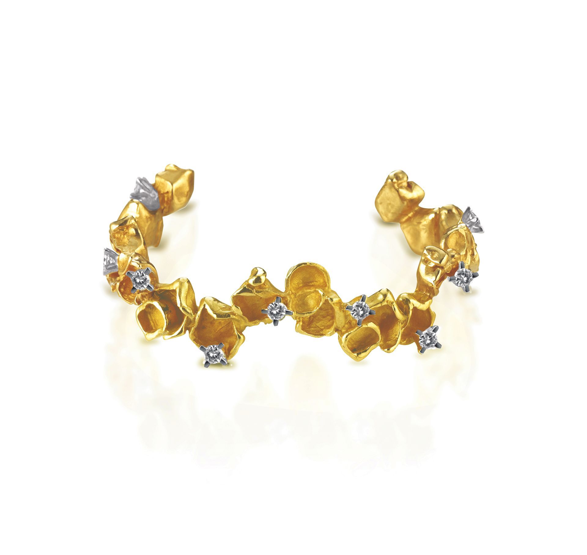 Bracciale in bronzo, argento e topazi bianchi