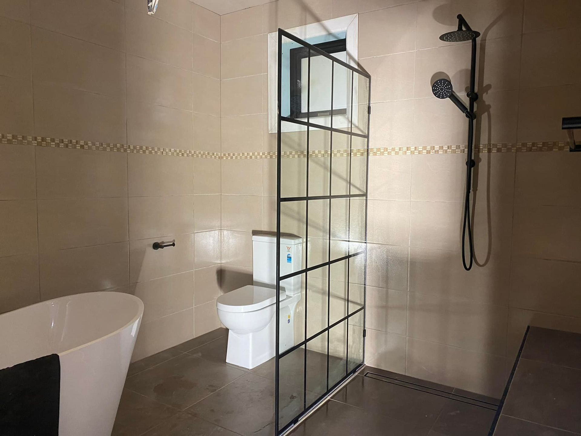 Modern Bathroom With Freestanding Tub — SJ Moore Plumbing & Roofing in Wagga Wagga, NSW