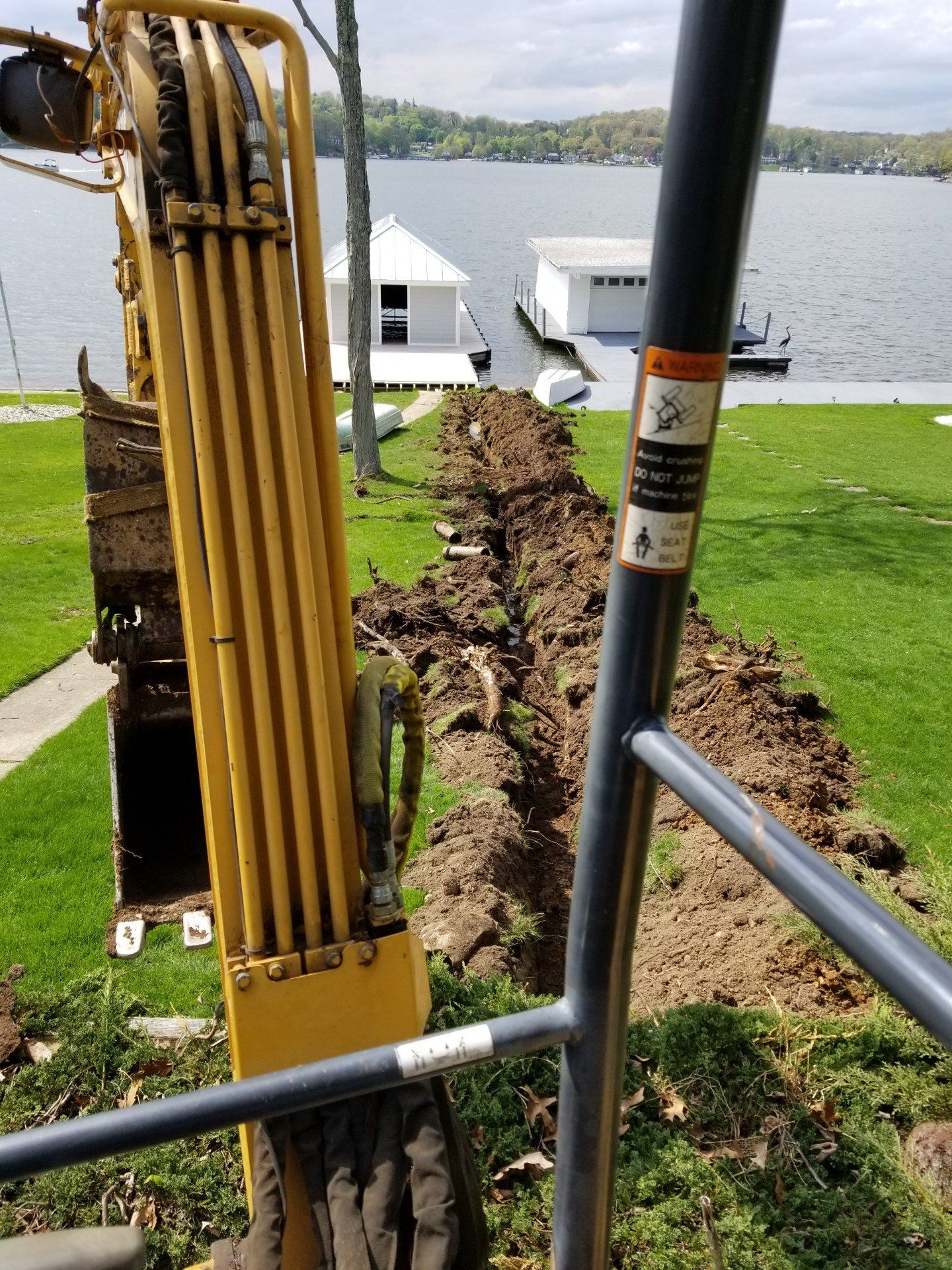 Heavy equipment excavating drainage