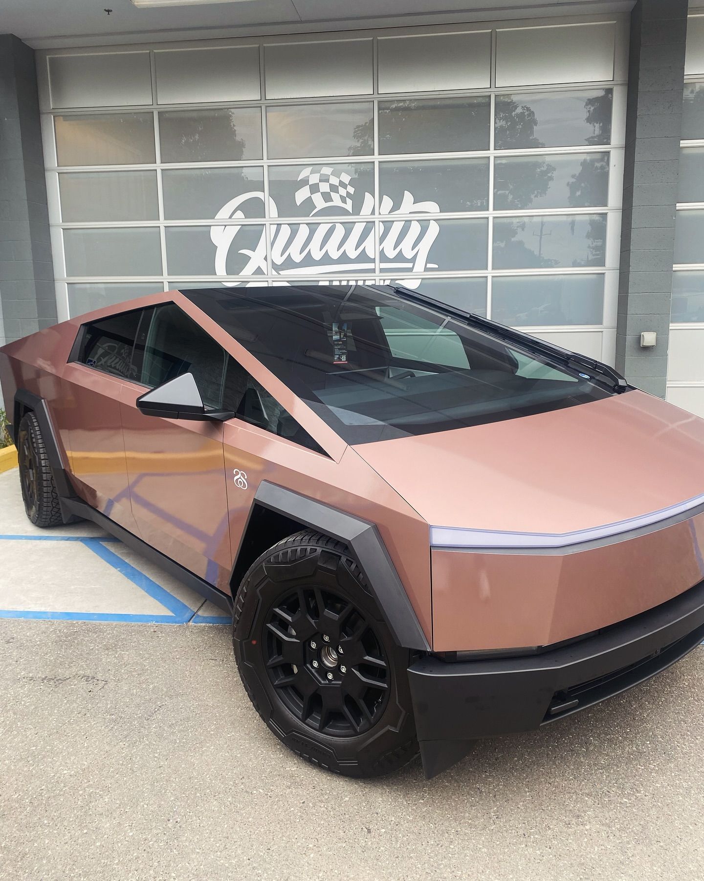 Copper rose gold Tesla Cybertruck color change vinyl wrap by Quality Tinting & Signs in San Luis Obispo